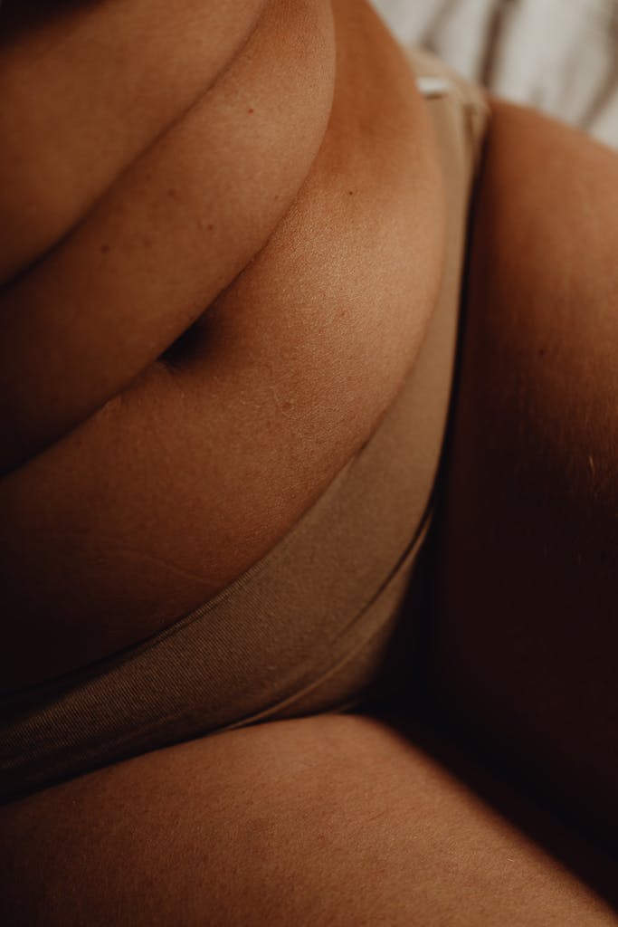 A close-up image highlighting body positivity and natural skin texture.
